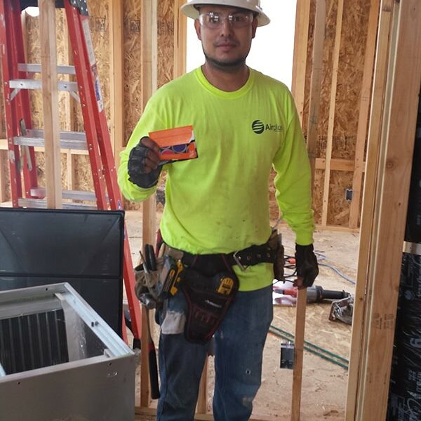 Airplus of California technician on a job site in Corona, CA.