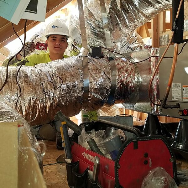 Airplus of California technician on a job site in Corona, CA.